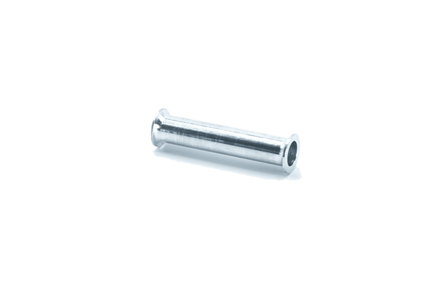 Travel reduction spacer